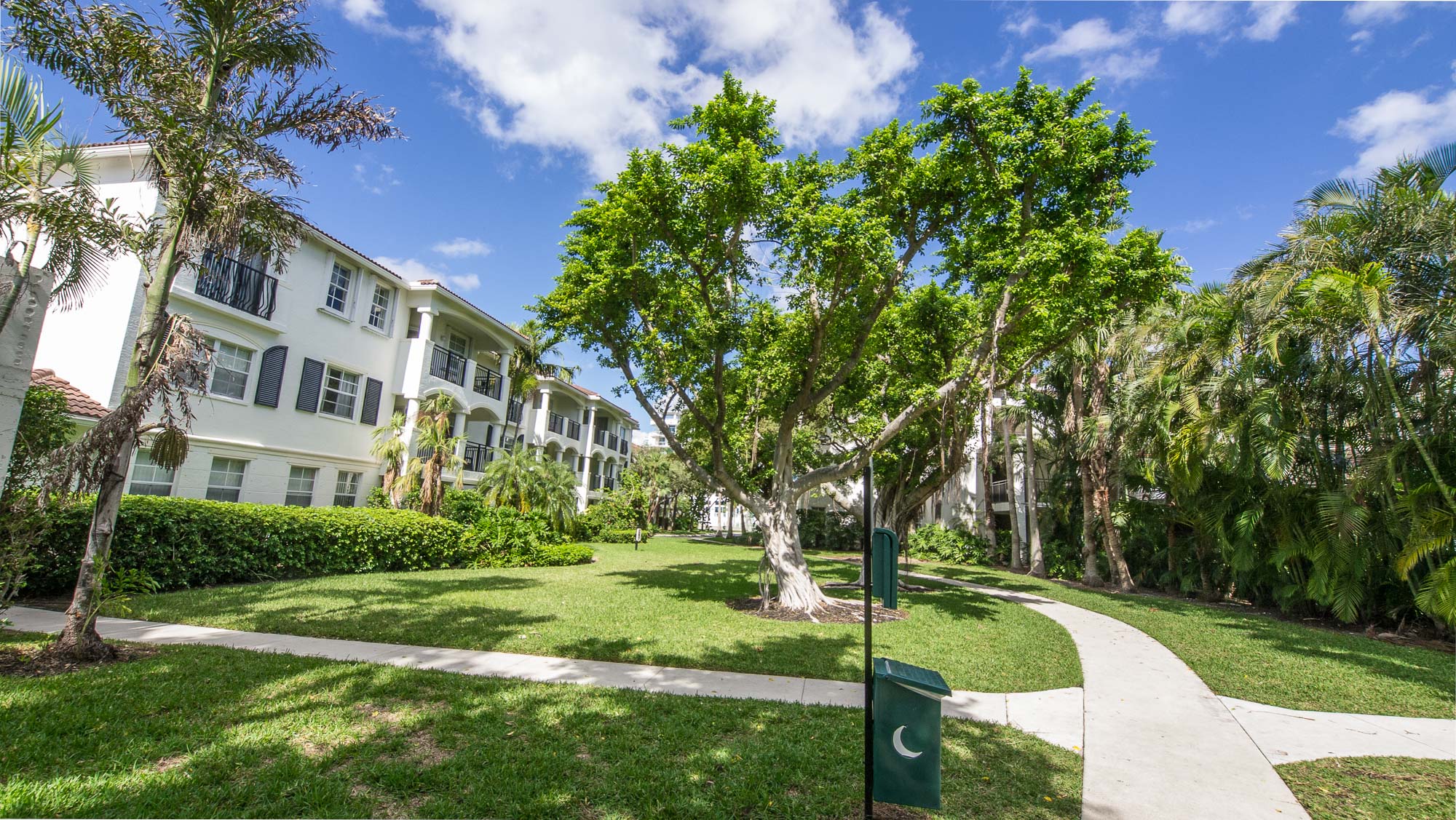Scenic view of the lush tropical garden and landscape at Village By The Bay, Aventura, Florida