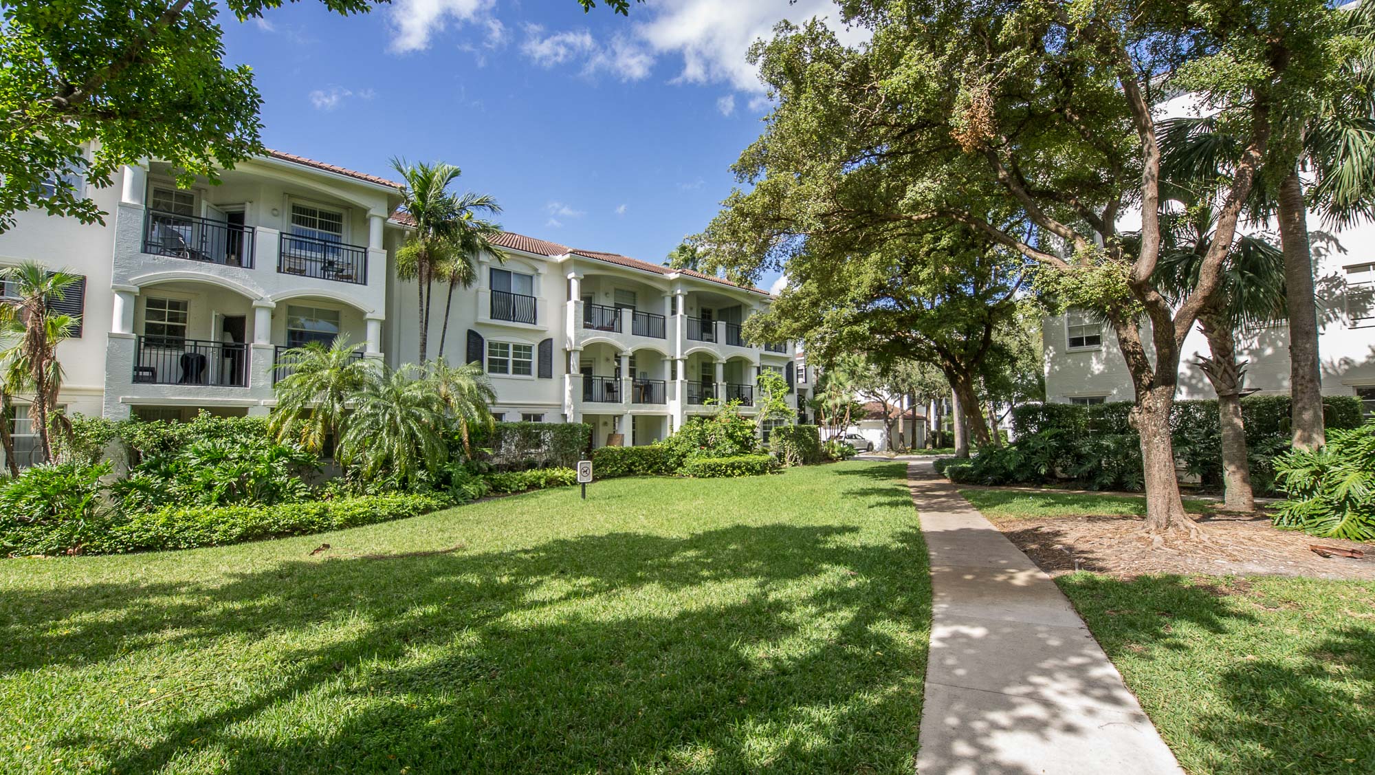 Scenic view of the garden and trees at Village By The Bay, Aventura, Florida