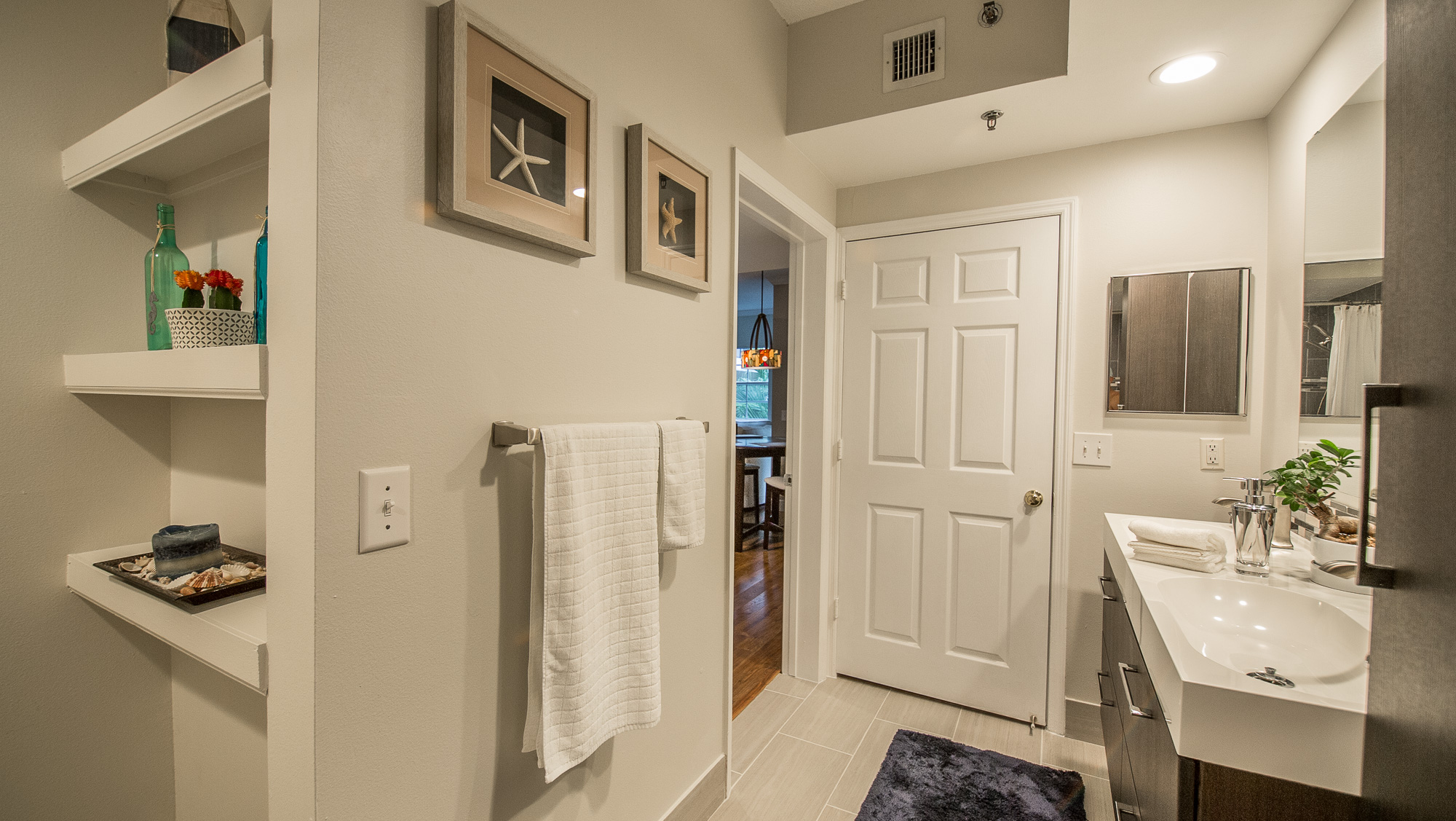 Entrance to the bathroom in a one-bedroom apartment at Village By The Bay, Aventura, Florida