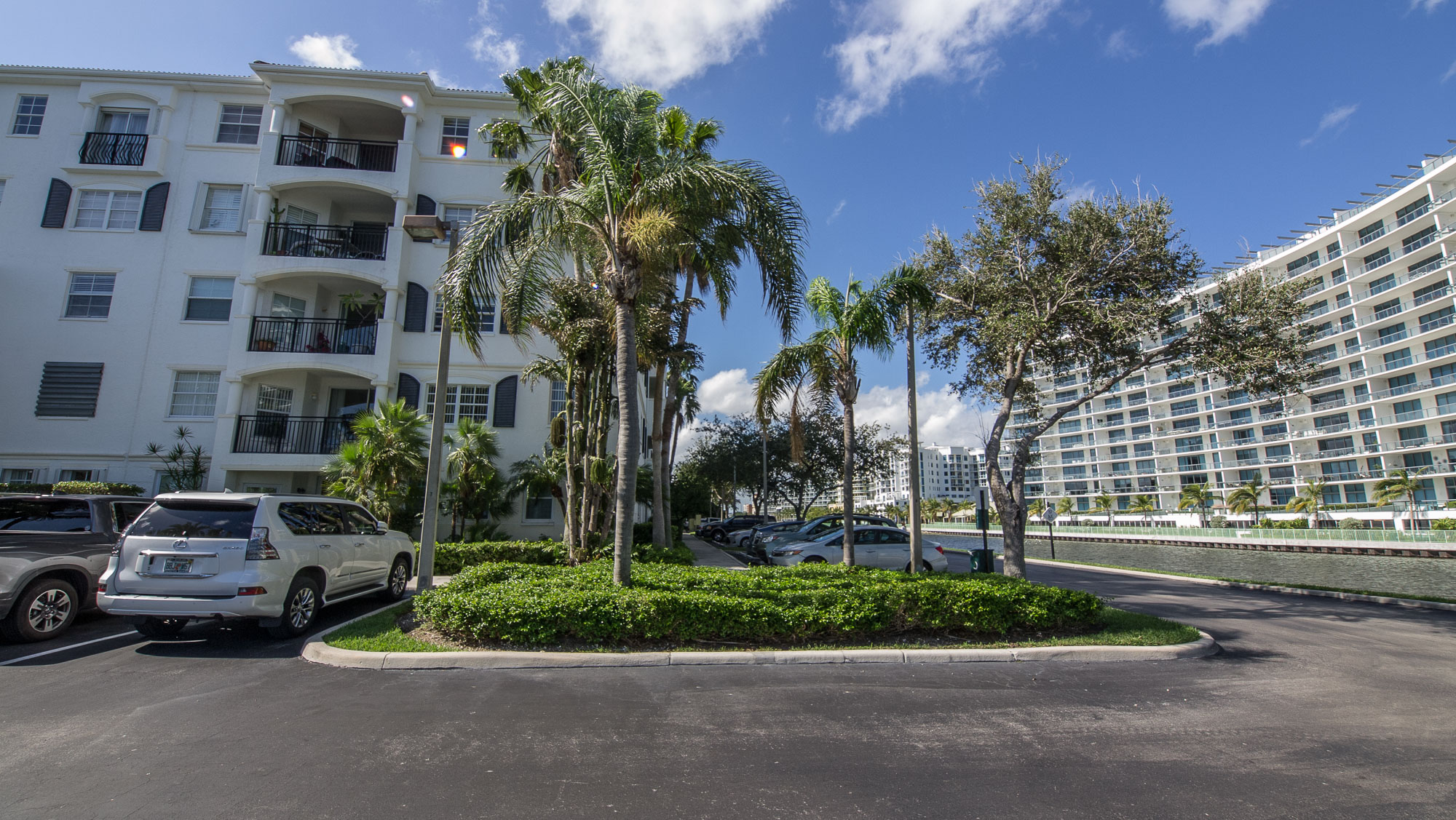 View of Building 12, the canal, and Echo Condo in Aventura, Florida
