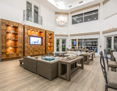 Interior view of the Club House and bar area at Village By The Bay, Aventura, Florida