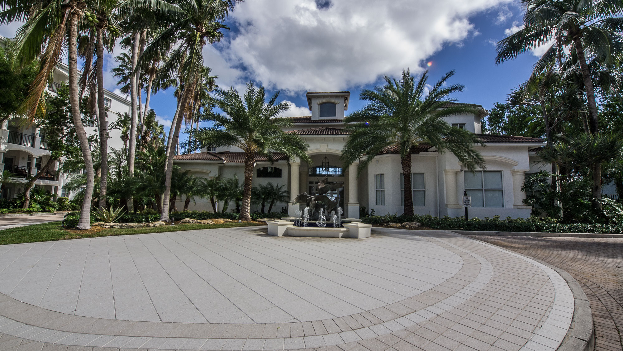 View of the Club House at Village By The Bay with Building 12 in the background, Aventura, Florida