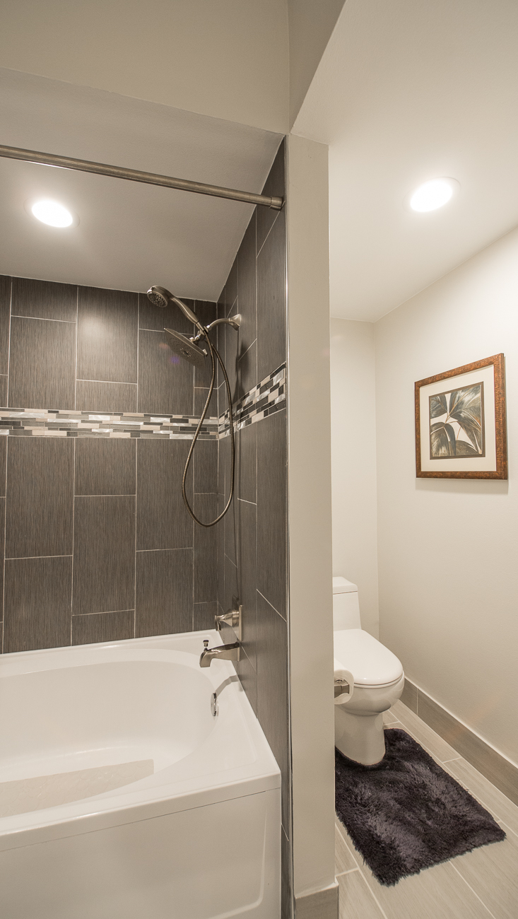 View of the shower and toilet in a one-bedroom apartment at Village By The Bay, Aventura, Florida